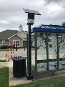 Sun In One solar bus shelter at highland village