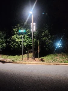 Parking lot lighting and security camera day